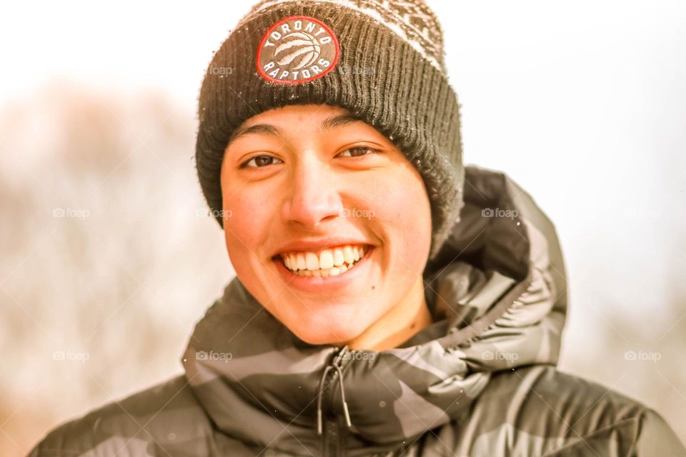 Handsome young man laughing