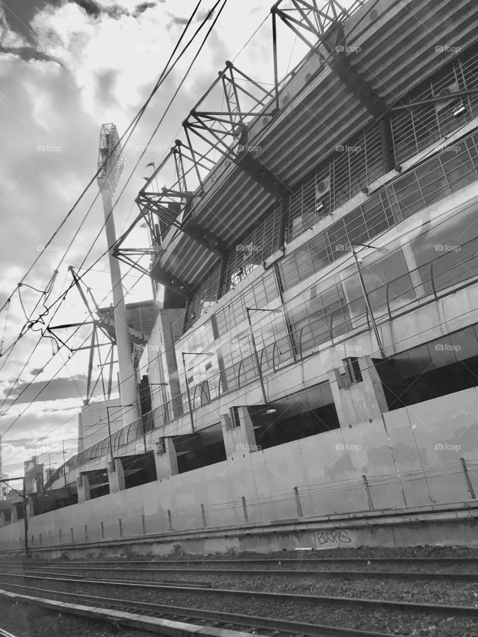 A black and white photo of the famous MCG from the rail yard. Melbourne Victoria Australia 