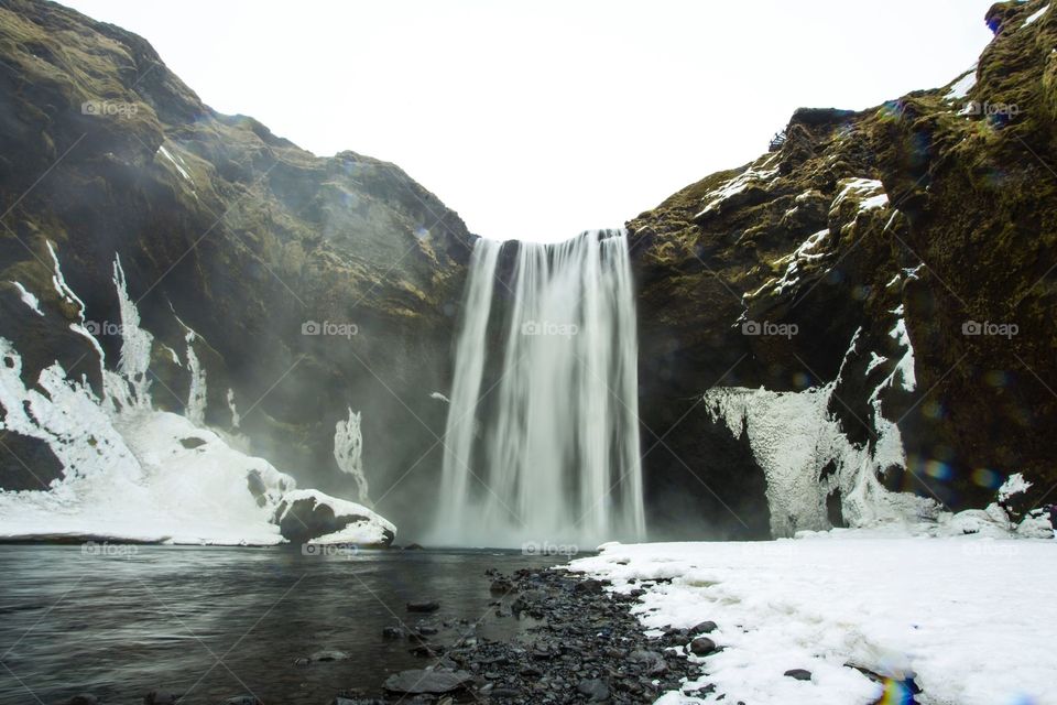 Waterfall in Iceland during winter.