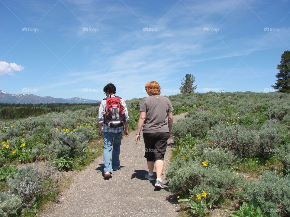 My mom and husband hiking in the grand Teton national park 