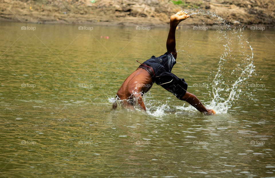 A story of street boy who was doing stunt  when bathing at river #summer