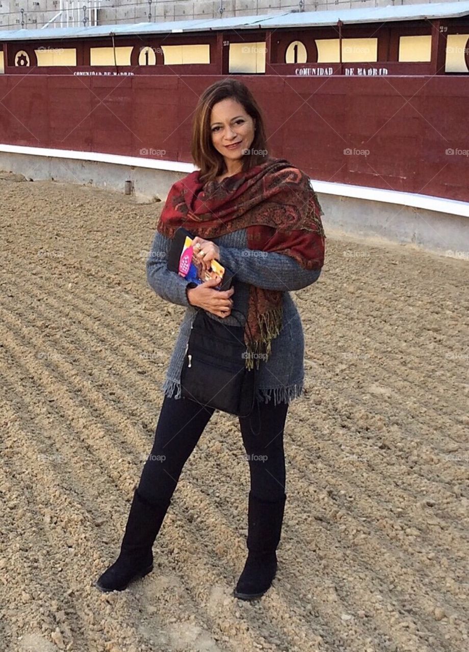 Elegant woman in the Plaza de Toros de Las Ventas in Madri, Spain.