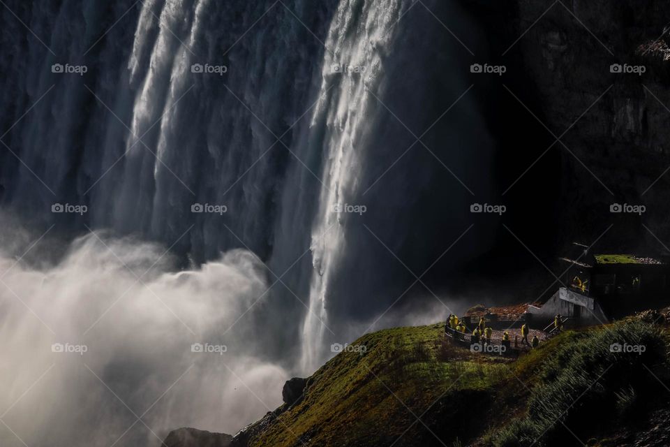 Group of people and Niagara falls