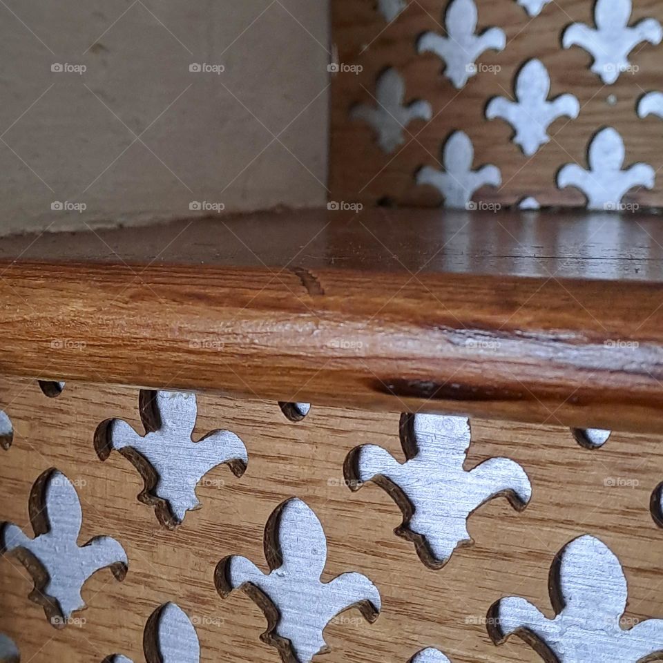 fleur de llys pattern on stairs wooden grey shiny step