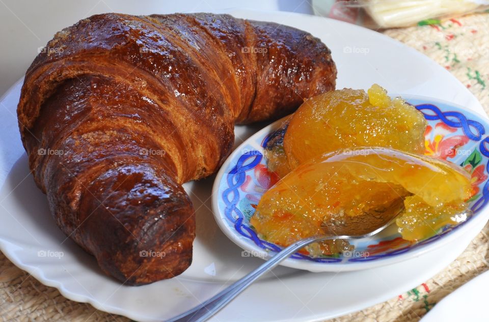 The best breakfast ever - croissant and orange marmalade 