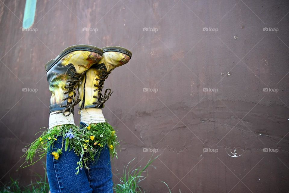 What's that doing here 😃? Funny scene, Woman Lying With her Feet Up and Have Flowers Inside the Boots