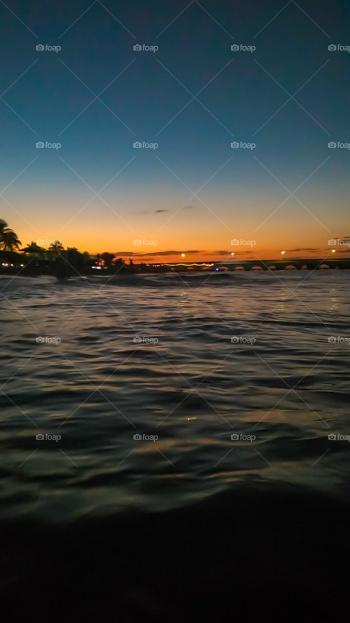 Beautiful blue and orange sunset on the beach