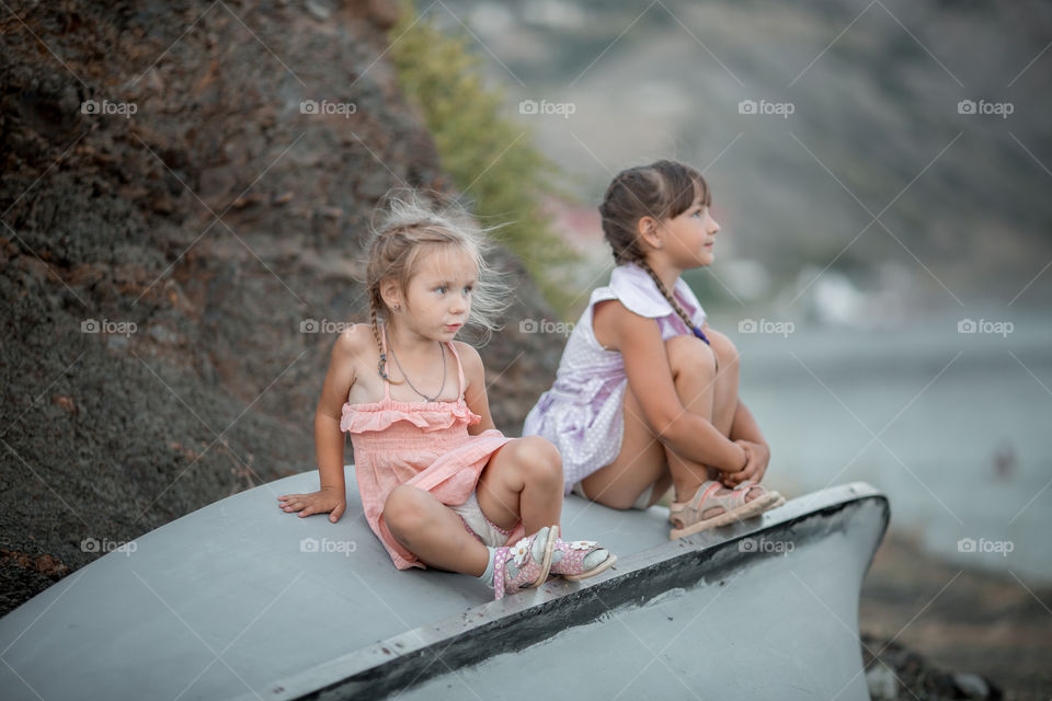 Little sisters playing outdoor