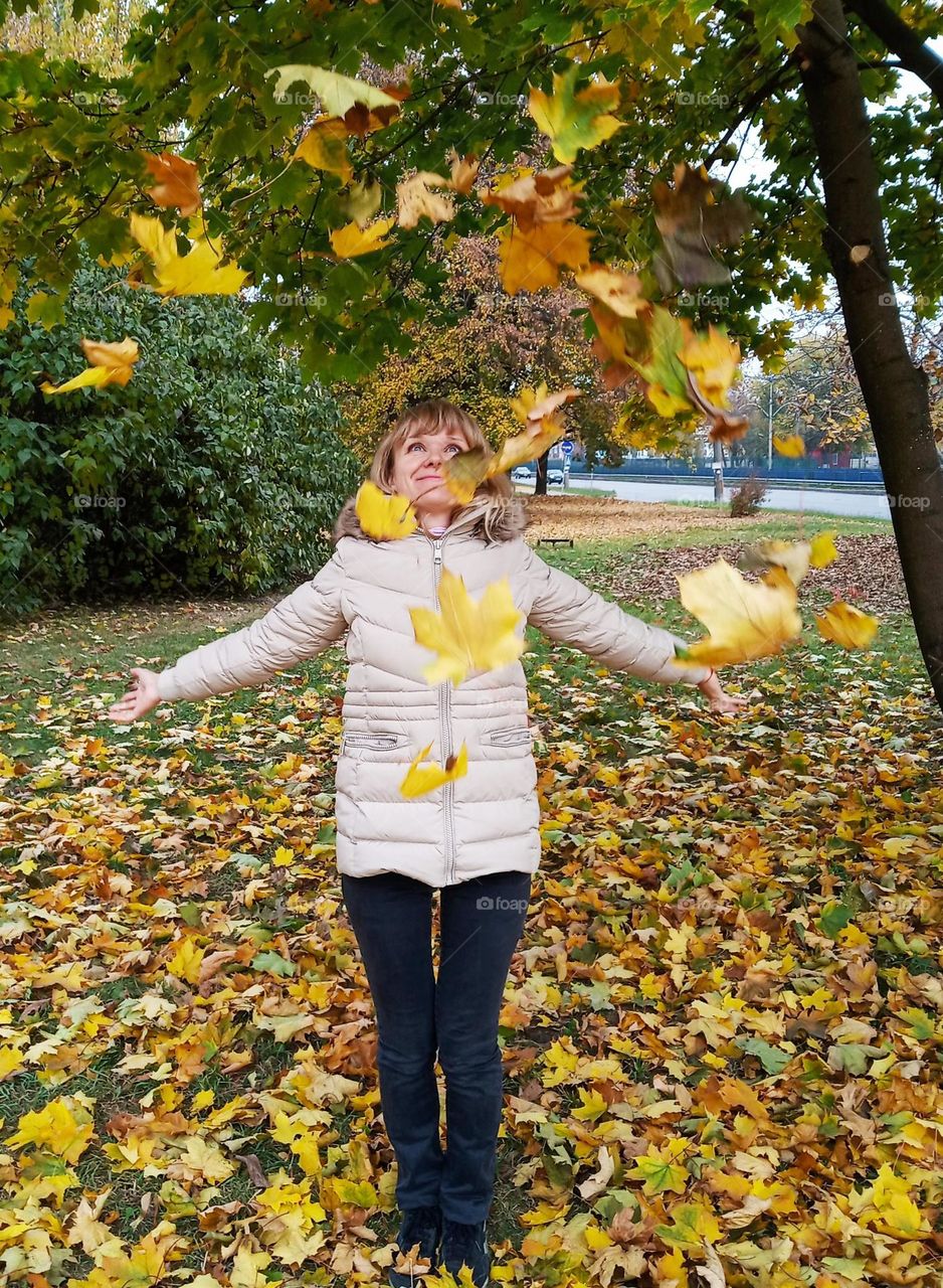 Fall Wins! (Bonus Exclusive Mission)
girl throws yellow maple leaves