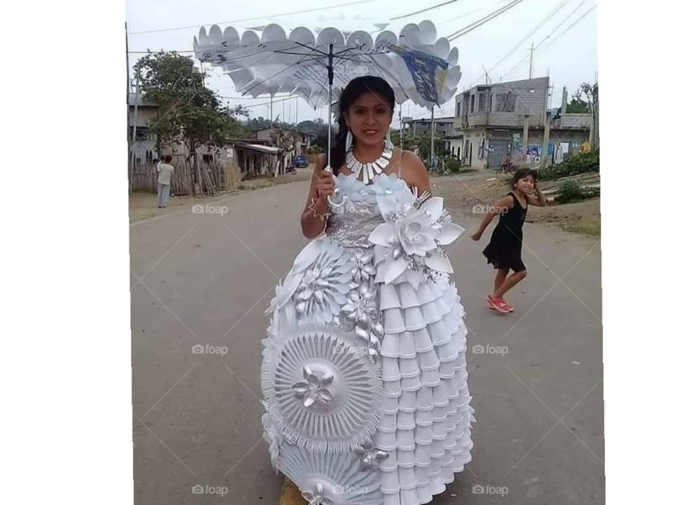 Dress  made  with cups,  forks and spoons.