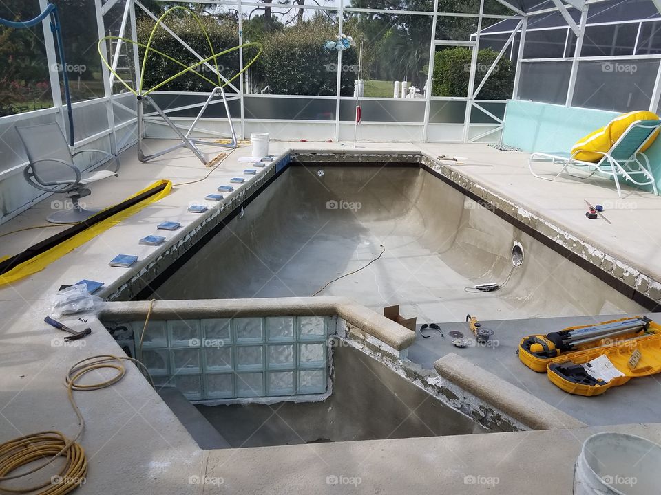 swimming pool renovation, tile stage