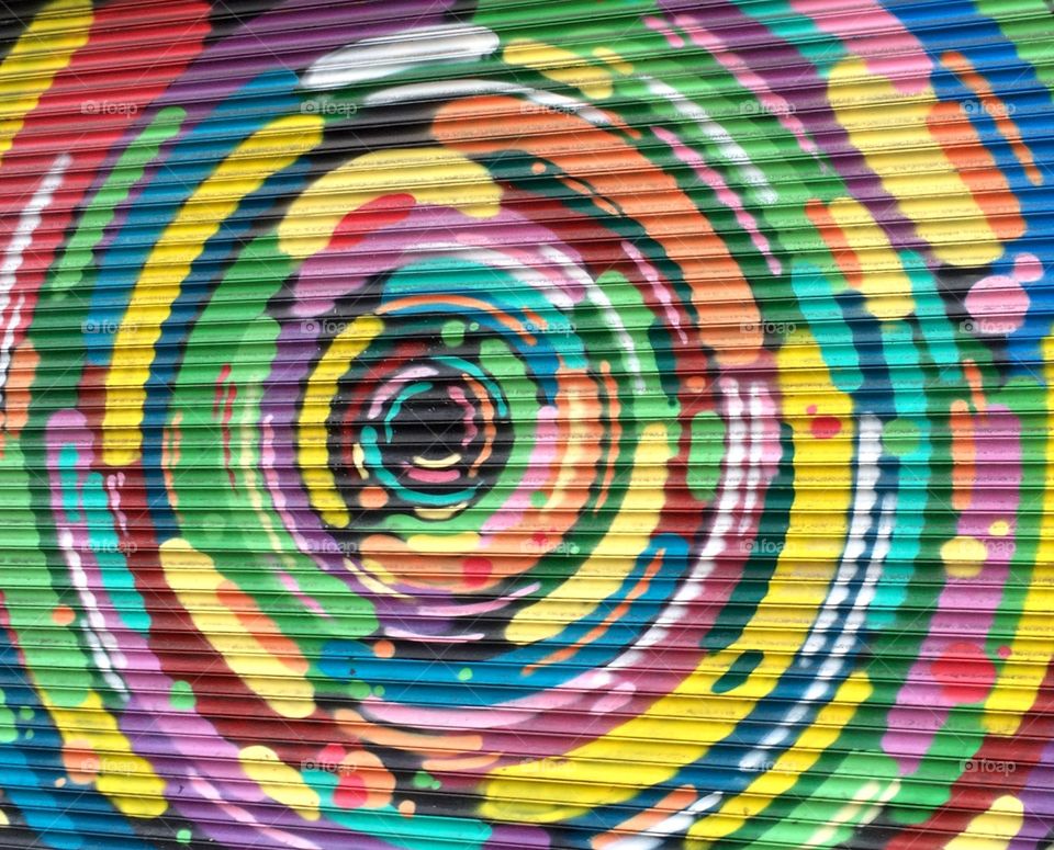Garage Bling ... sharing with you my fellow foapers ... a photo I took in Dublin early in the morning whilst searching for a shop to buy some milk for breakfast ... beautiful colourful spiral on a garage door 💜