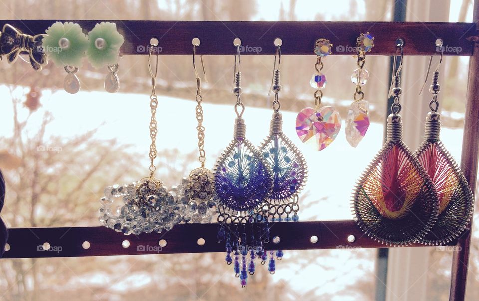 Earrings and winter background 
