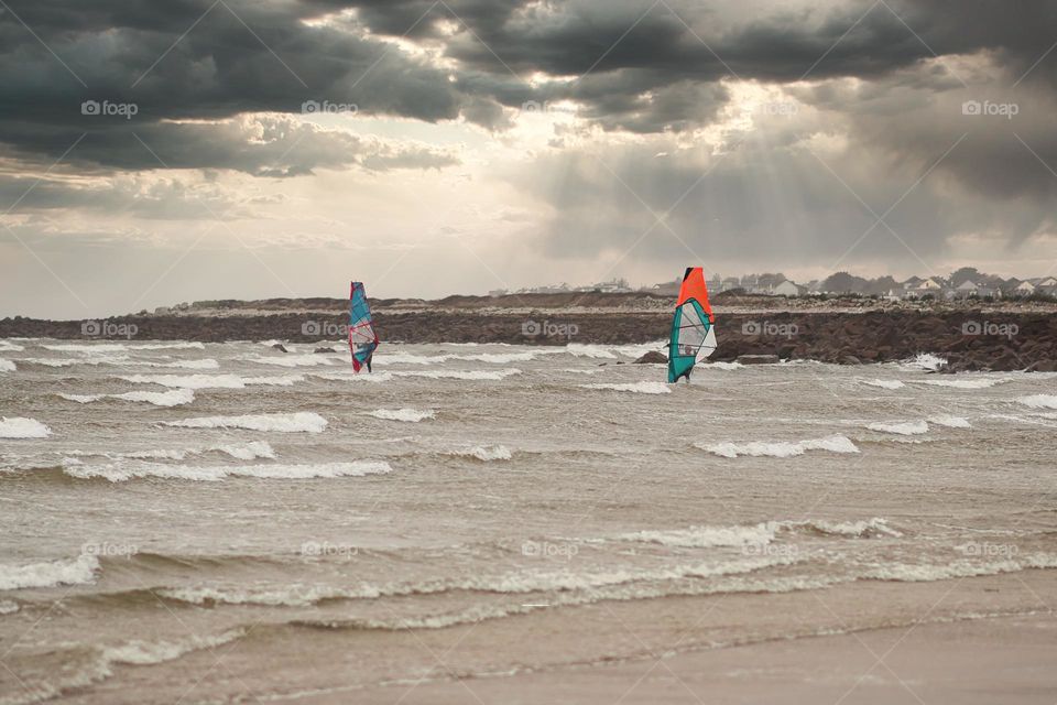 Windsurfing at Silverstrand beach in Galway, Ireland