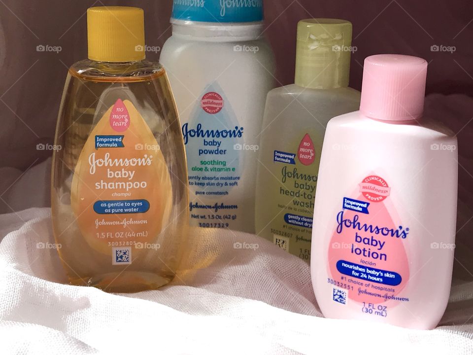 Johnson and Johnson baby products with a soft pink background