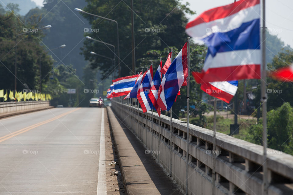 Row of flag on bridge