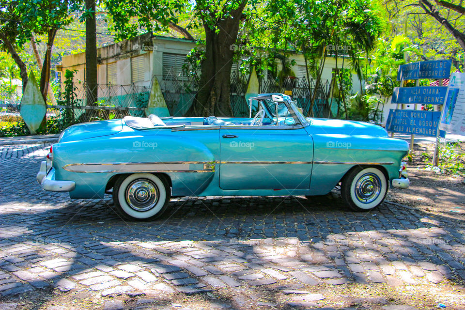 Blue classical car in Cuba