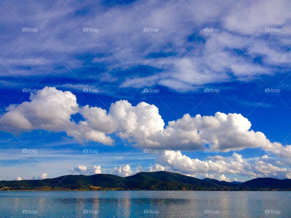 Trasimeno lake. view of Lake Trasimeno in a gay of clear skies
