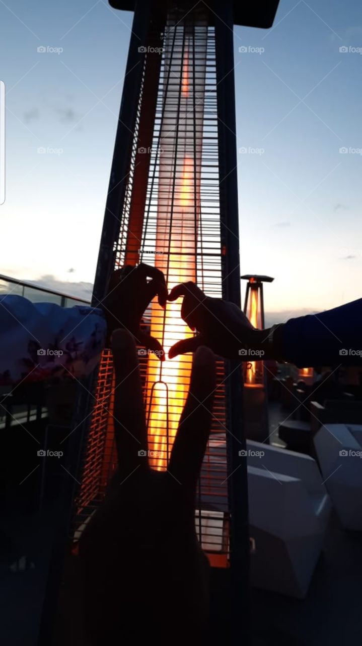 three hand, three people creating a memory.