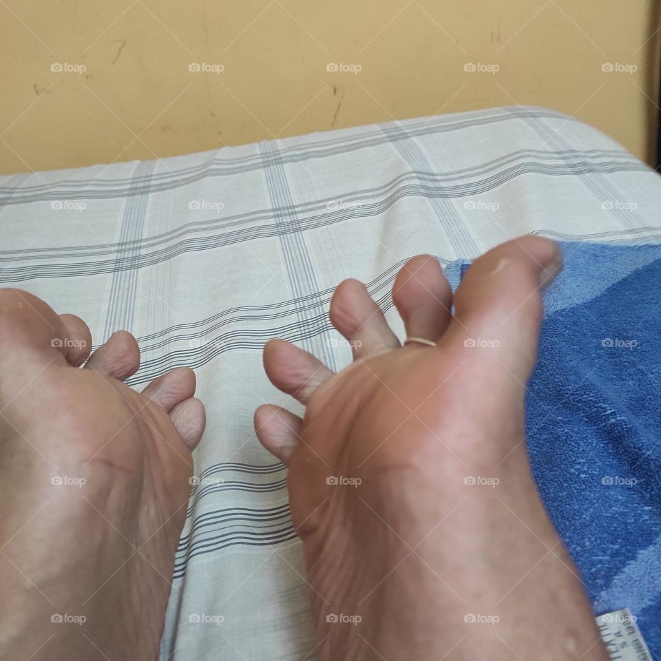 Feet soles showing lower part from toering