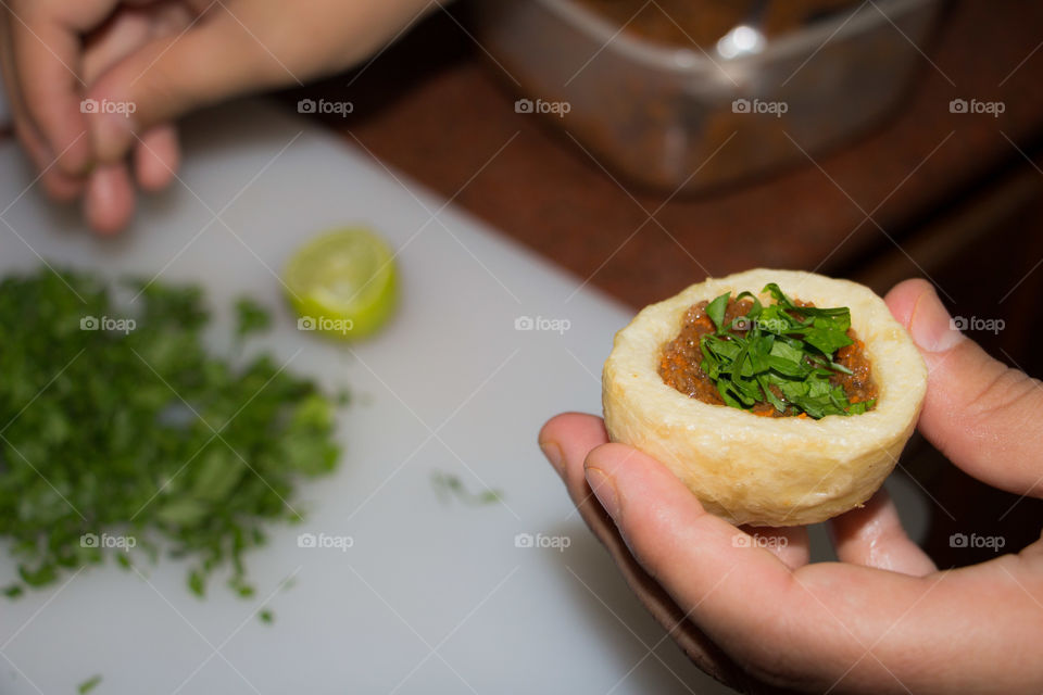 Adding final touch to food