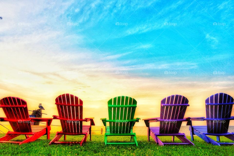 colorful chairs in the summer time.