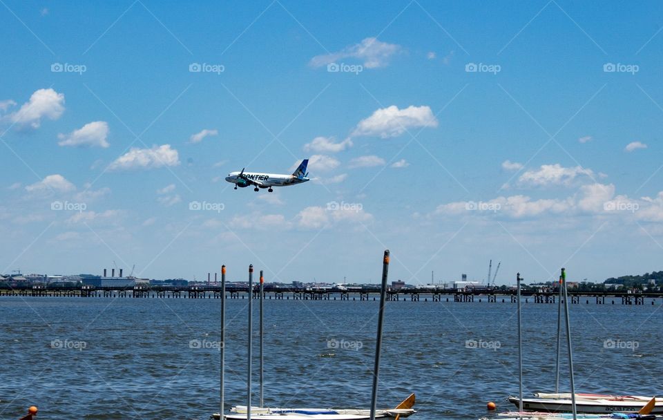 Airplane over water