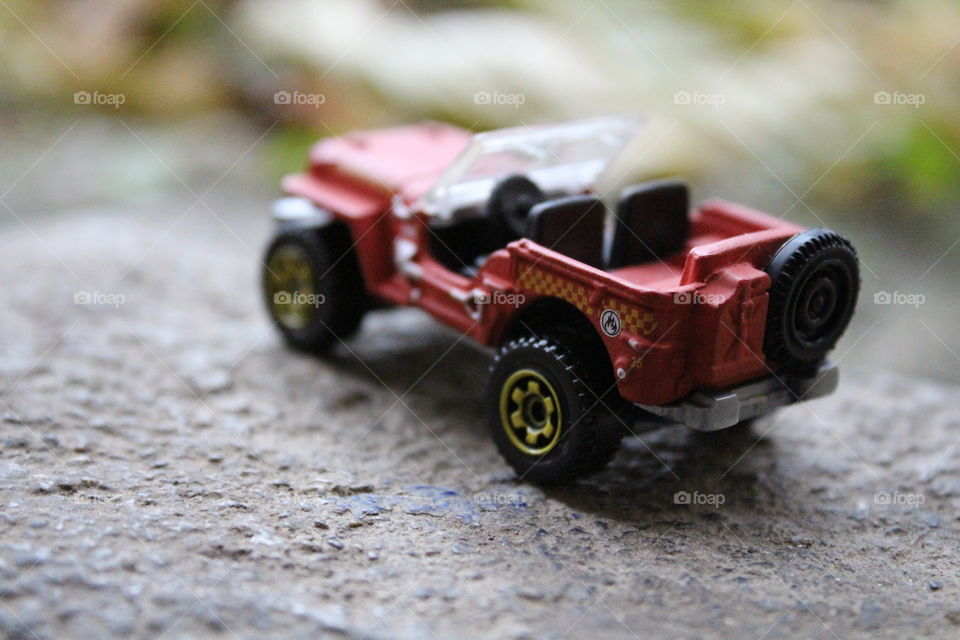 Red toy jeep