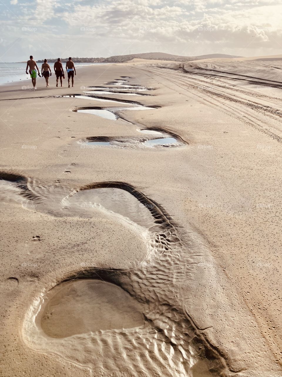 Morning walk in the Brazilian beach 