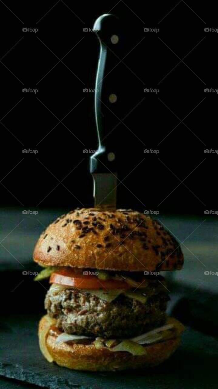 Burger with knife