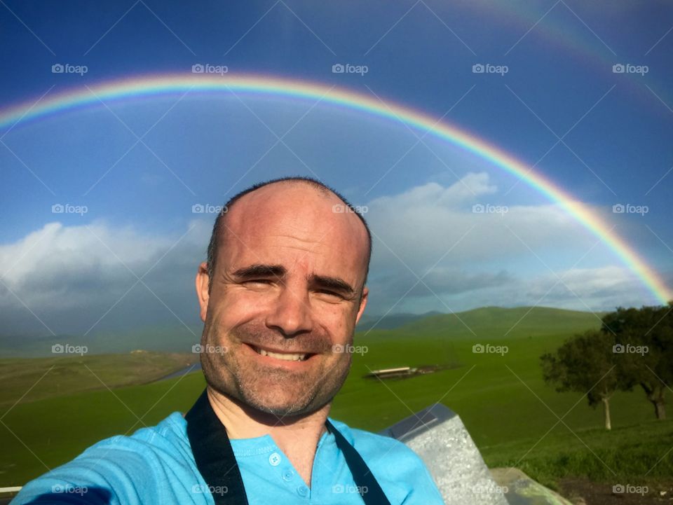 Beautiful double rainbow selfie in central California