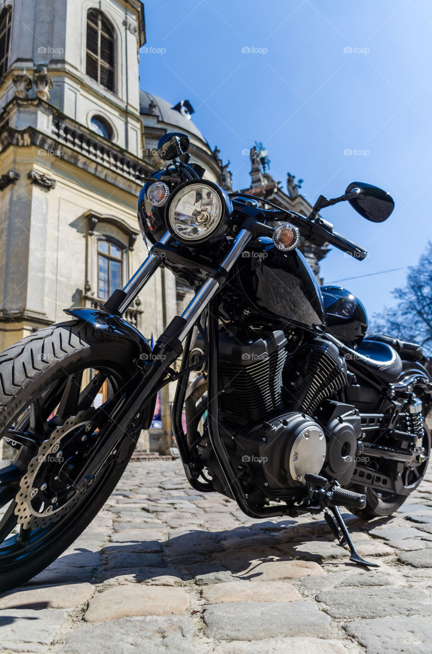 Black classic motorcycle on the street