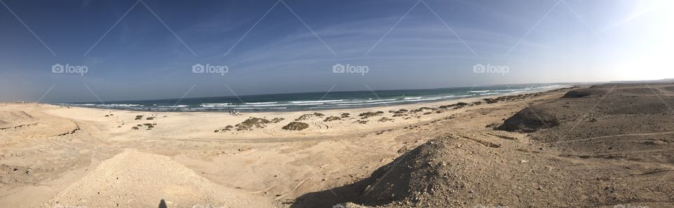 This was a panoramic photo of a beach in Oman , very secluded area but such a beautiful country