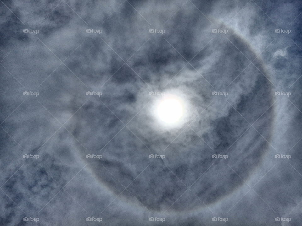 Round rainbow around the sun
