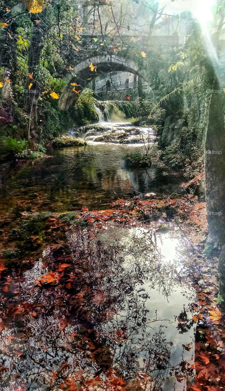 Admiring a tiny waterfall in Piges Kryas,Livadeia