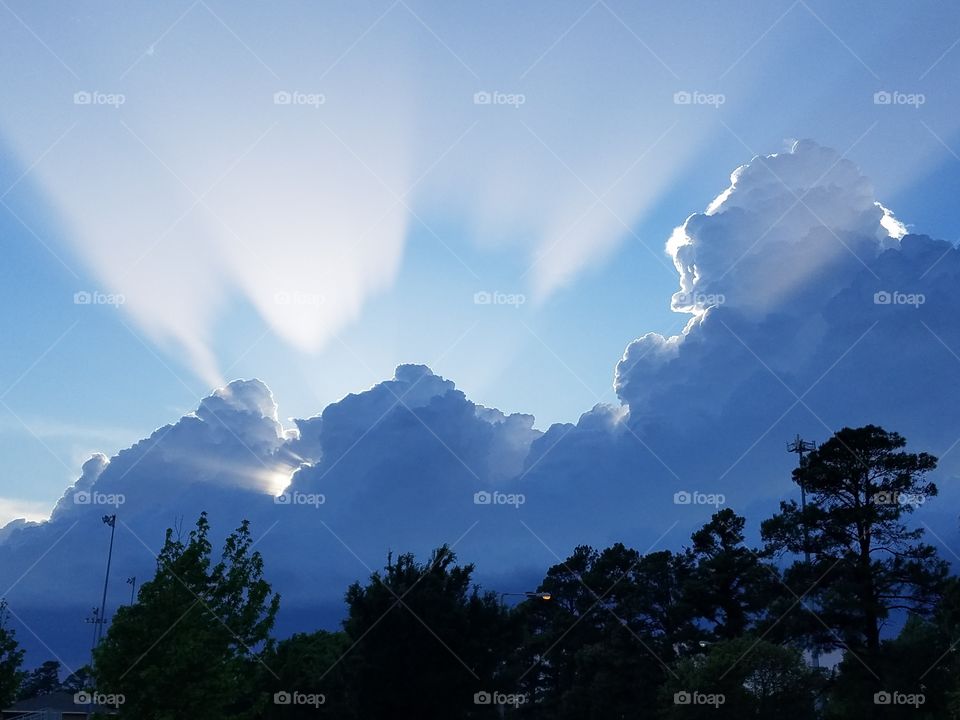 Sun rays through storms