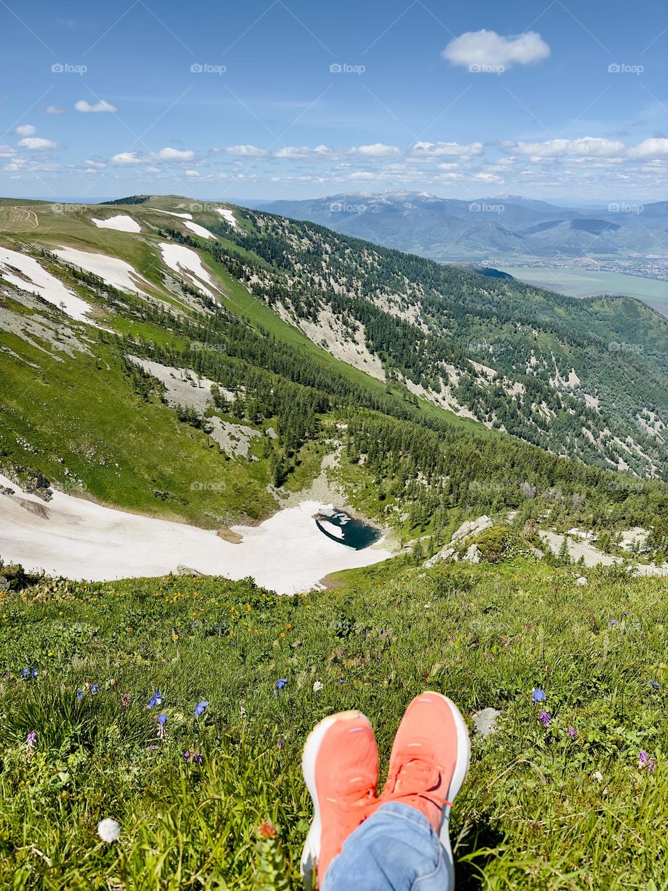 admiring the mountains sitting on top