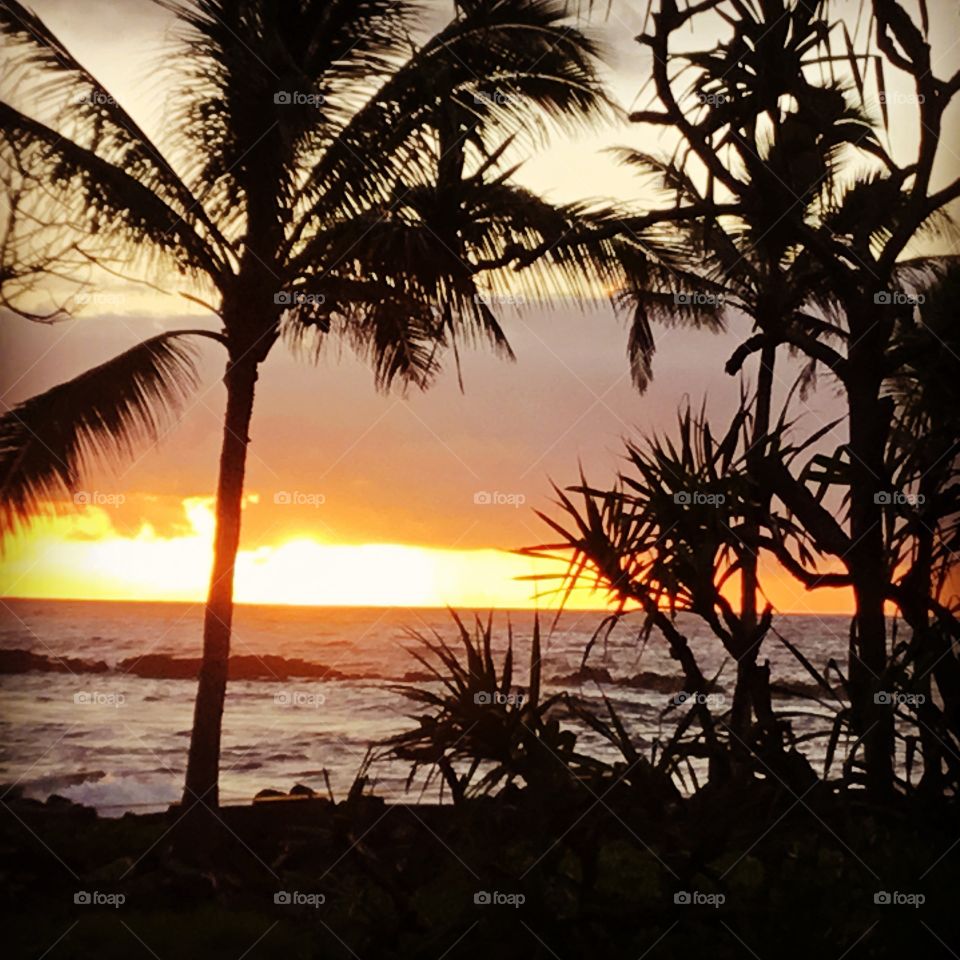 Sunrise at the warm ponds at Ahalanui Park on the Big Island of Hawaii.