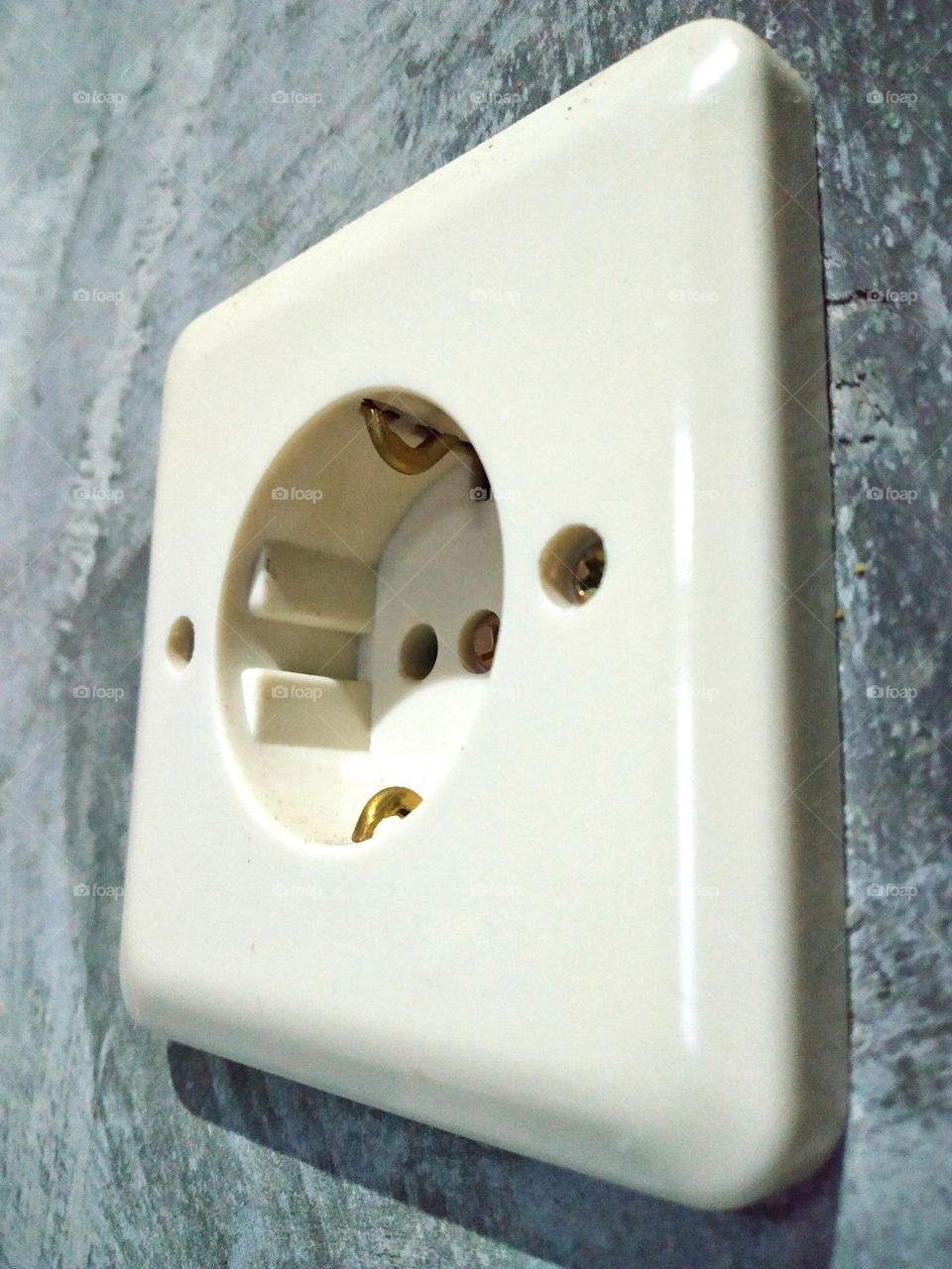 Wall-mounted white box electric plug