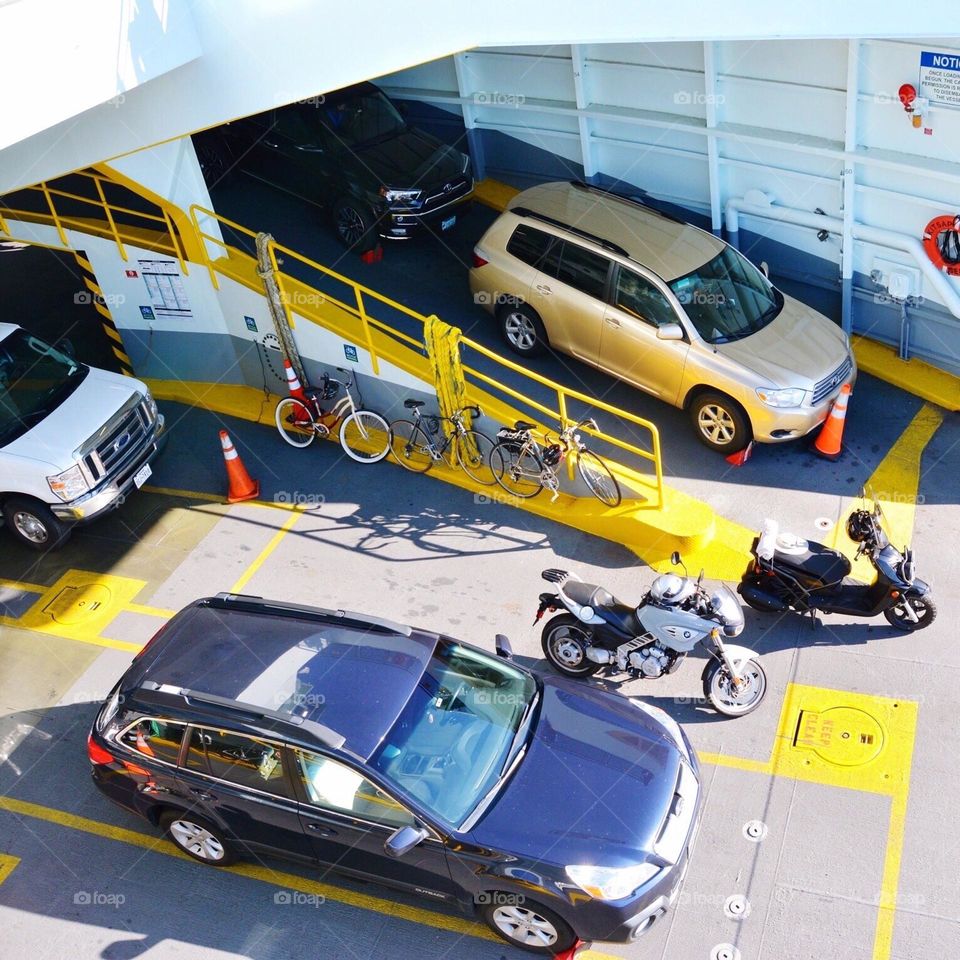 Cars, bicycles, motorcycle, scooter on the ferry!