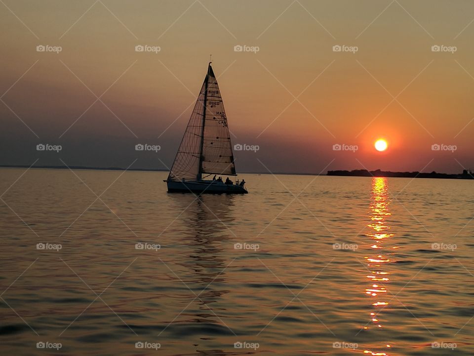 sun set sailboat