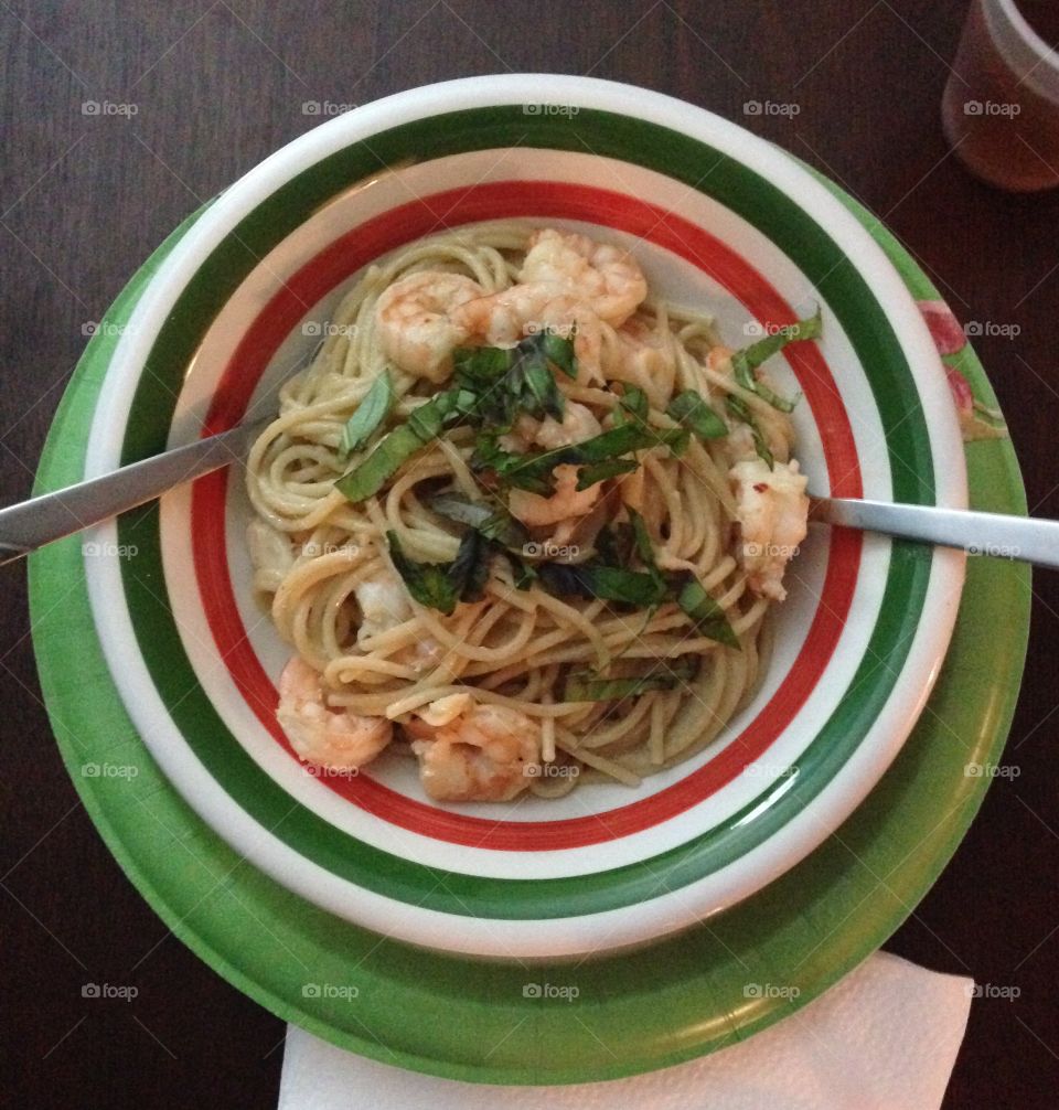 Shrimp scampi over pasta