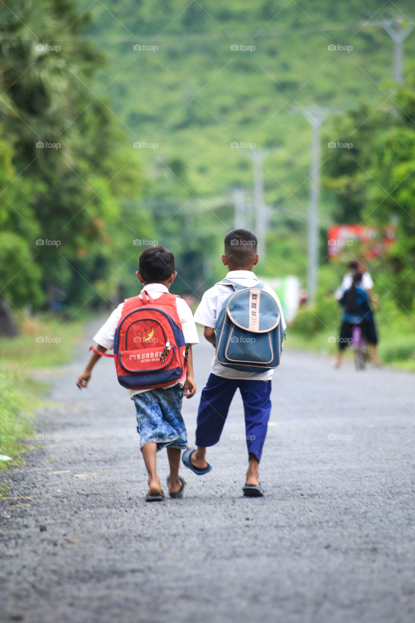 They are back to school. After a long holiday all the children in kampong Chhnang, Cambodia came back to school.