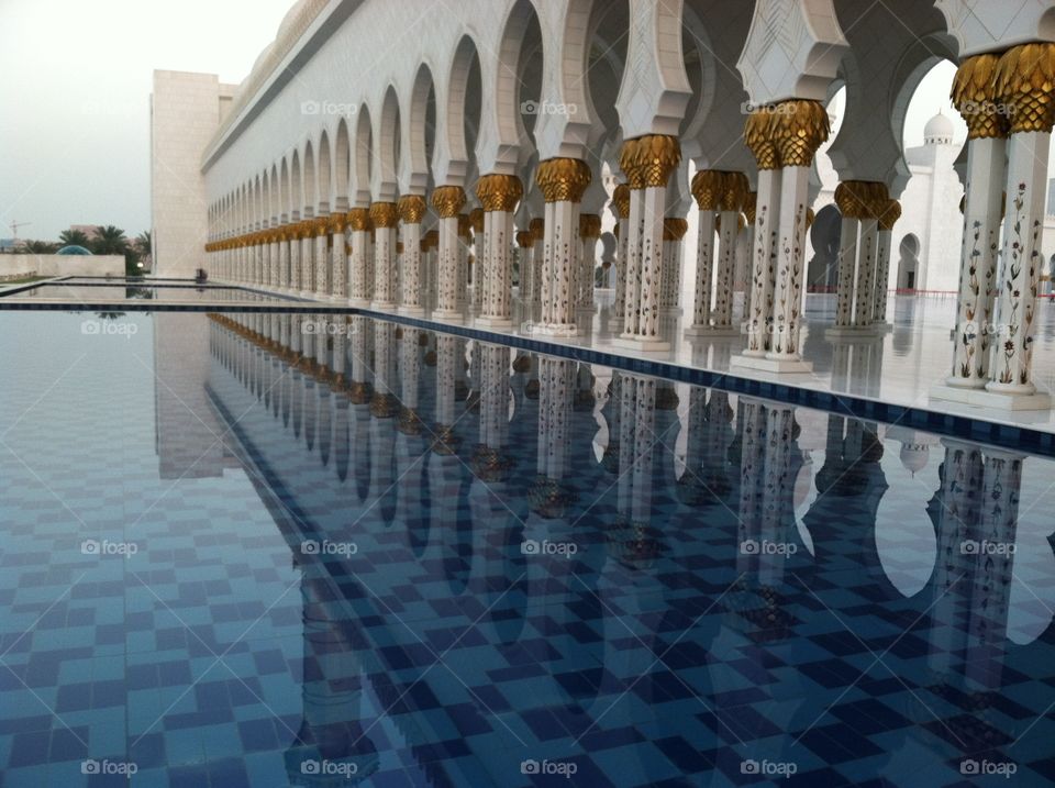 Reflection of columns in a pool at the Grand Mosque in Abu Dhabi.