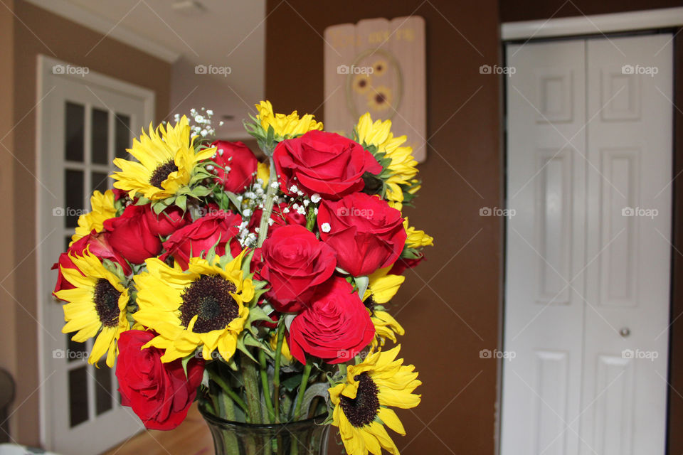 Beautiful roses and sunflowers in my kitchen make my day brighter!