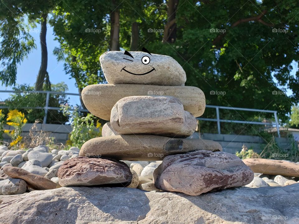 Inuksuk rock statue with knowing happy wink