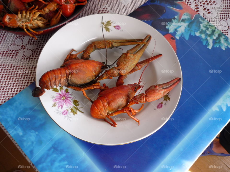 Two big boiled crayfish in a plate