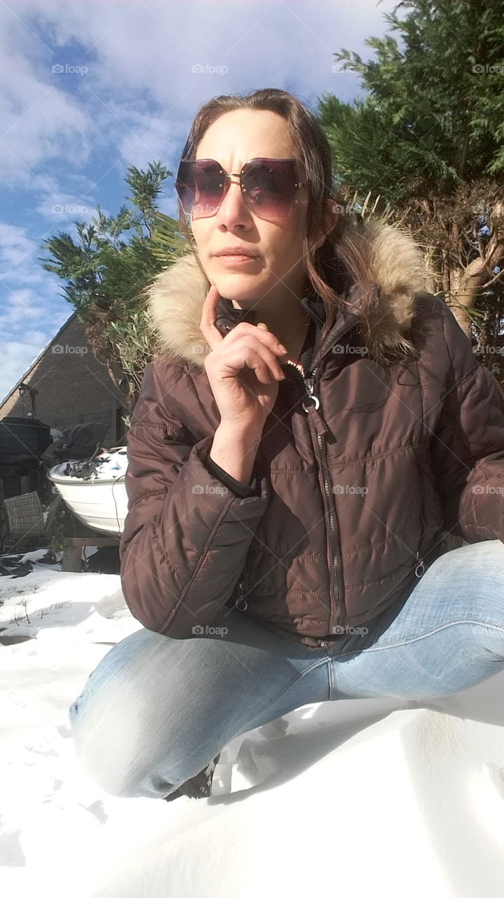 to sit for the camera