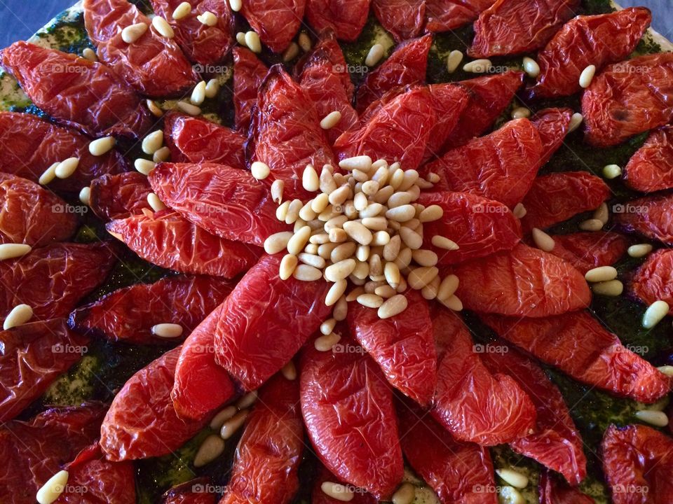 Roasted tomatoes and Pine Nuts
