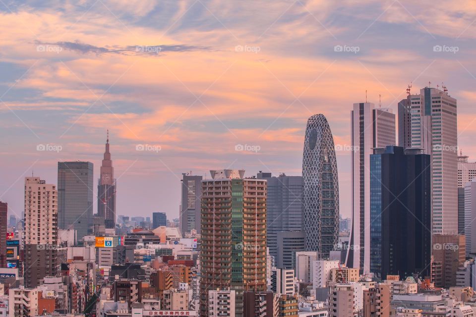 Shinjuku skyline at sunset. One of the most crowded central districts of Tokyo, Japan in the 23 special wards.